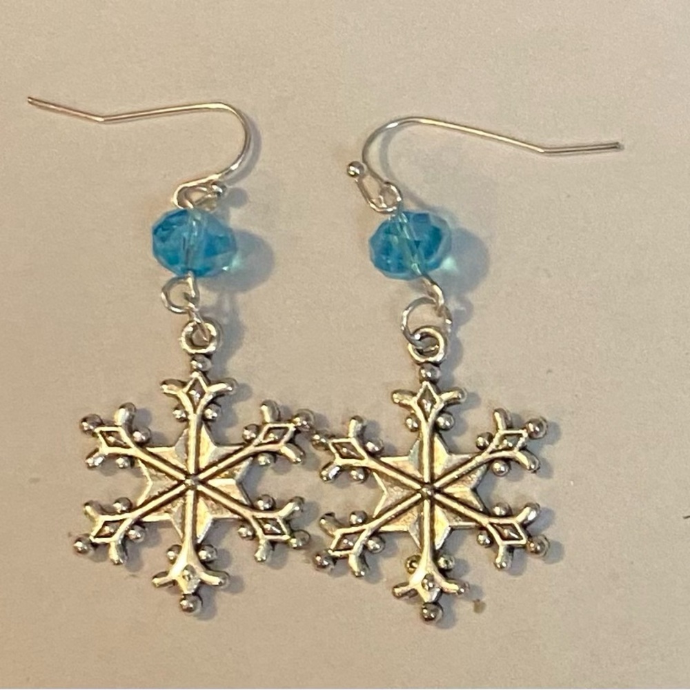 Snowflake charm & blue crystal earrings